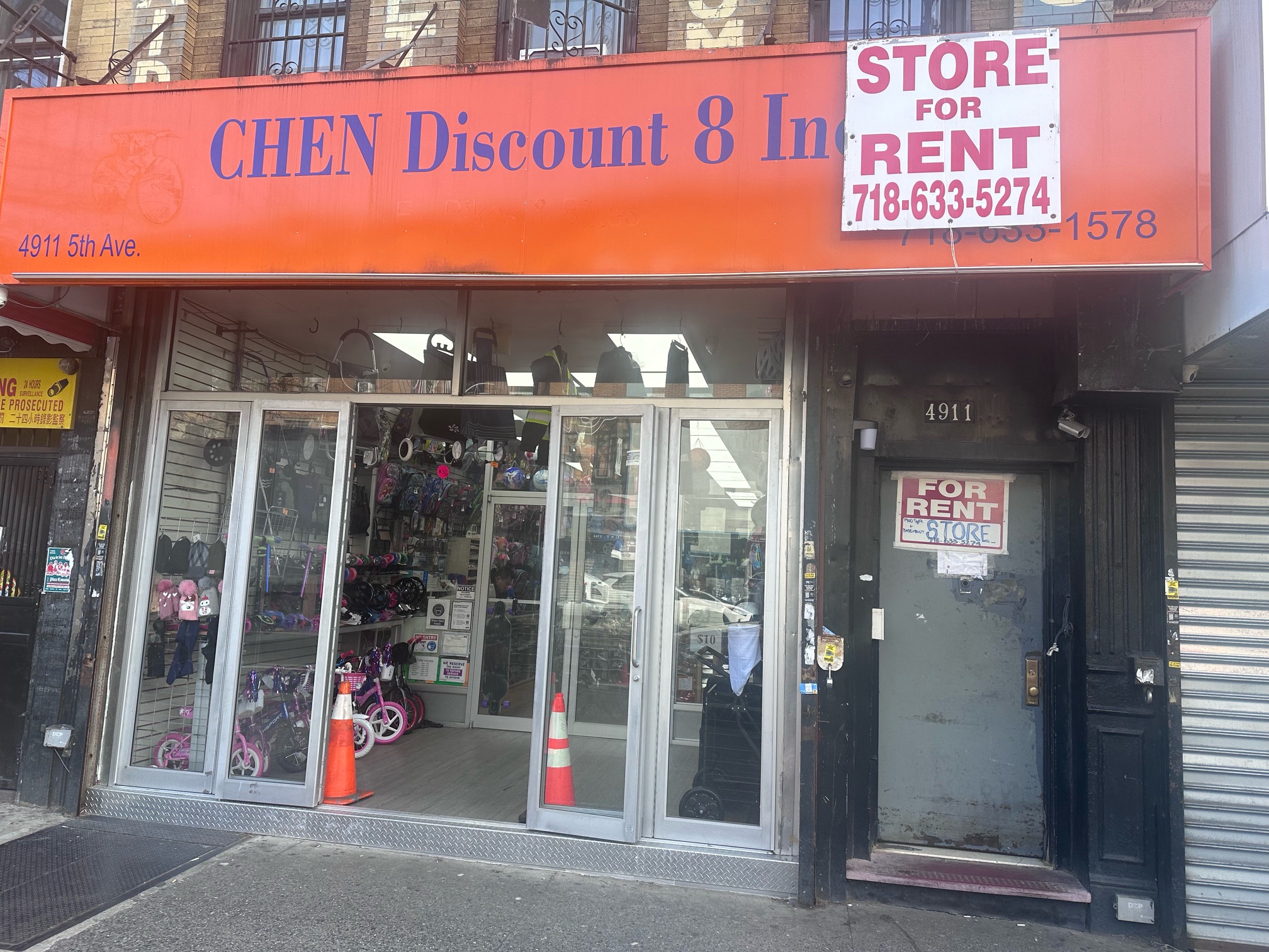 Storefront of "chen discount 8 inc." with a "for rent" sign displayed above the entrance. the shop's windows showcase various items including toys and household goods.