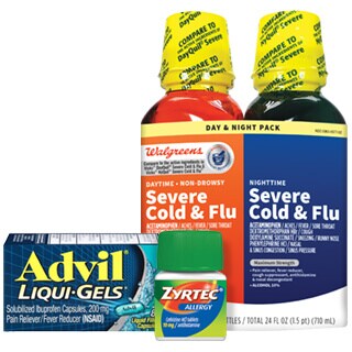 Day and night cold and flu medication packs branded by walgreens and bottles of advil liqui-gels and zyrtec capsules, all arranged against a white background.